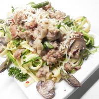 Fettuccine and Zoodles Topped with Chicken Sausage, Asparagus, and Mushrooms_image