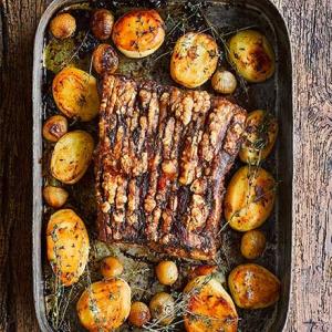 Roast pork belly, fondant potatoes & pickled onions_image