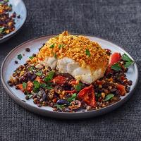 Harissa-crumbed fish with lentils & peppers image