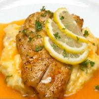 Cajun Snapper and Shrimp over Bacon Cheddar Cheese Grits with Red Pepper Coulis_image