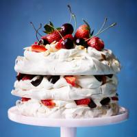 Amaretto meringue cake with strawberries & cherries image