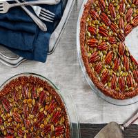 Chocolate, Pecan, and Pumpkin Seed Pie With Gingersnap Crust image