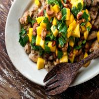 Black Pepper Chicken Thighs With Mango, Rum and Cashews image