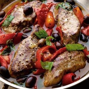 Garlicky lamb with peppers & couscous image
