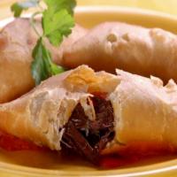Beef and Goat Cheese Empanada with Piquillo Pepper Sauce and Pickled Red Onion_image