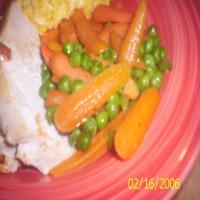 Buttered Baby Carrots and Sweet Peas image