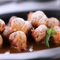 Bananas Foster Beignets with Cafe Brulot Creme Anglaise image