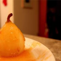 Flambeed Vanilla-Poached Pears with Apricot Sauce_image