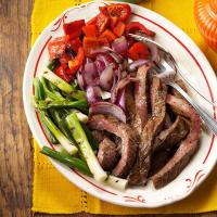 Grilled Skirt Steak with Red Peppers & Onions_image