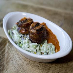 Lamb Belly With Peas, Fava Beans and Cashew-Date Romesco image