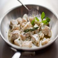Olive-Oil Poached Halibut Nuggets With Garlic and Mint image