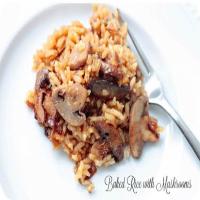 YUMMY BAKED RICE WITH BEEF CONSOMMÉ AND MUSHROOMS image