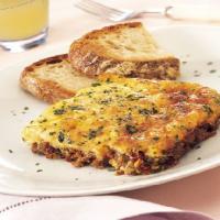 Sausage and Egg Casserole with Sun-Dried Tomatoes and Mozzarella image