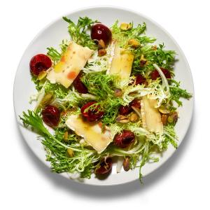 Frisée With Pickled Cherries, Pistachios and Brie image
