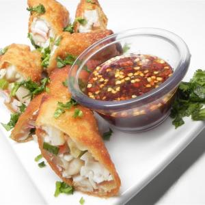 Crab-Filled Egg Rolls With Ginger-Lime Dipping Sauce image