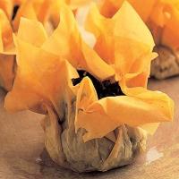 Cheesy spinach parcels image