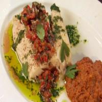 Steamed Wild Striped Bass with Yellow Pepper Romesco, Red Pepper-Black Olive Relish and Parsley-Garlic Oil image