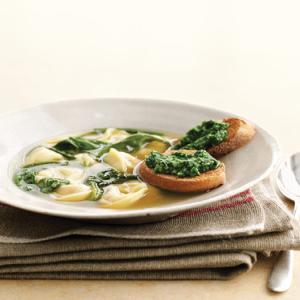 Meat Tortellini in Broth with Arugula and Pesto Toasts image