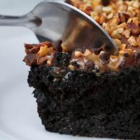 Chocolate Turtle Poke Cake Recipe by Tasty image