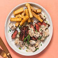 Bavette steak with chips, tarragon & mushroom sauce & watercress salad_image