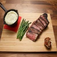 New York Strip with Maitre Butter, Horseradish Mashed Potatoes and Asparagus_image