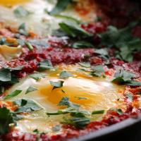 North African-style Poached Eggs In Tomato Sauce Recipe by Tasty image