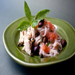 Rice Sticks With Uncooked Tomato Sauce, Tuna, Capers and Olives image