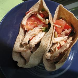 Little Italy Chicken Pitas With Sun-Dried Tomato Vinaigrette image