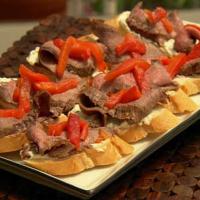 Molasses Marinated Flank Steak with Roasted Red Peppers image