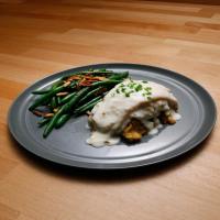 Crab-Stuffed Flounder with Mornay Sauce and Green Beans Almondine image