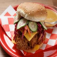 Fried Chicken Sandwich with Cabbage Slaw, Pickles, American Cheese and Maple Mustard Sauce_image