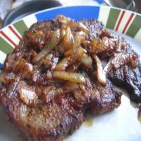 Steak with Caramelized Onions image