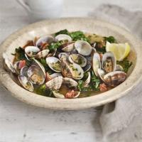 Steamed clams in saffron & spring green broth image