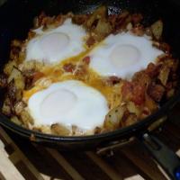 Baked Eggs With Bacon and Tomatoes image