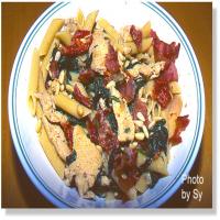 Pasta With Chicken, Spinach, Pine Nuts, Bacon And image