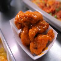 Chicken Wings with Buffalo Sriracha, Bourbon Teriyaki, Szechuan Garlic and Parmesan Sauces image