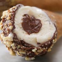 Homemade Chocolate-Covered Ice Cream Cones Recipe by Tasty image