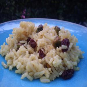 Indian Sweet Saffron Rice With Raisins and Pistachios image