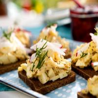Open-Faced Egg Salad Tea Sandwiches with Crab and Poppy Seeds on Pumpernickel image