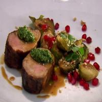 Spice Rubbed Pork Tenderloin with Roasted Brussels Sprouts, Jalapeno Pesto and Pomegranate image