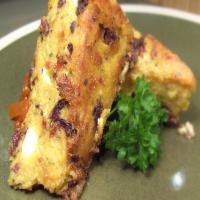 Cheesy Sun-Dried Tomato and Olive Polenta Wedges image
