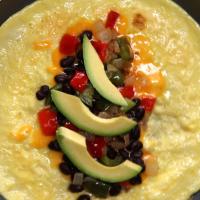 Avocado & Black Bean Egg Wrapped Breakfast Burrito Recipe by Tasty_image