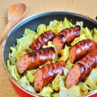 GREEN CABBAGE BRAISED IN BEER AND SAUSAGE image