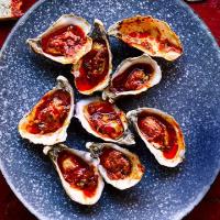 Barbecued oysters with garlic, paprika & Parmesan butter image