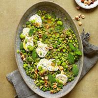 Lemony broad beans with goat's cheese, peas & mint image