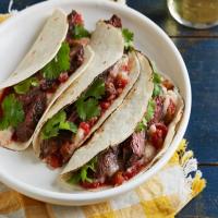 Salsa-Marinated Skirt Steak Soft Tacos with Refried White Beans_image