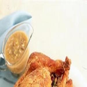 Roast Vermont Turkey with Giblet Gravy and Sausage and Sage Dressing, for Thanksgiving image