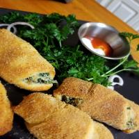 Spinach and Artichoke Dip-Stuffed Crescent Rolls image