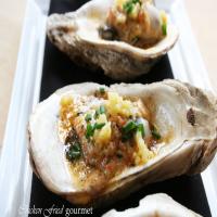 Grilled Oysters with Crawfish Butter, Pickled Corn and Chives_image