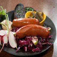 Braised Wurst Sausages with Cabbage, Red Onion and Apple Slaw image